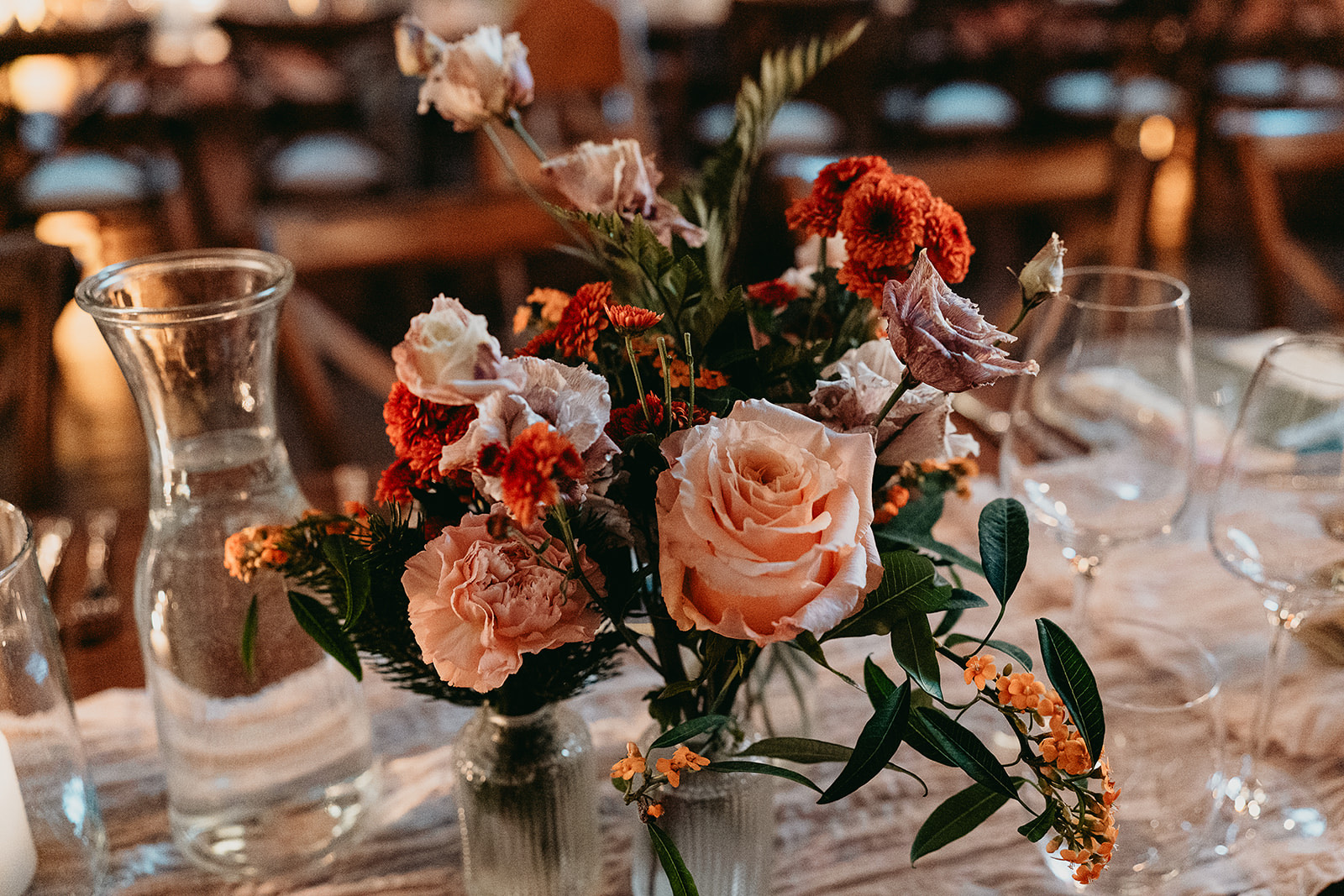 Seasonal table flowers by Botanica for a winter wedding at Cowdray House