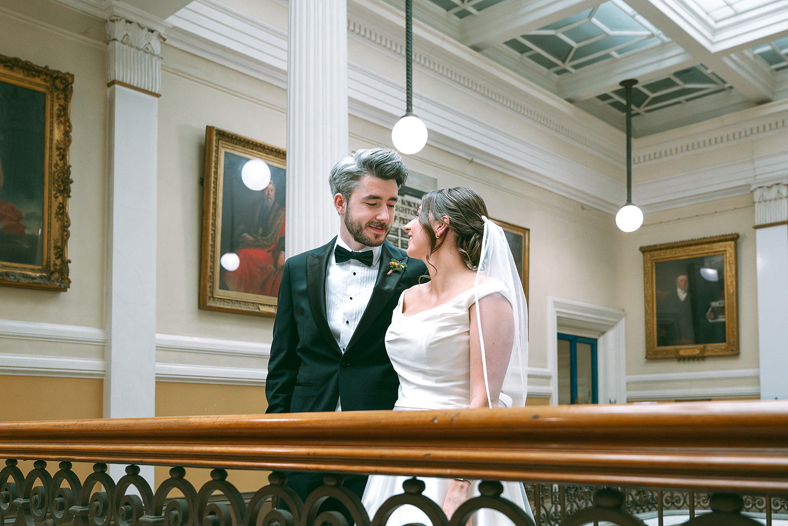 Newlyweds on the balcony at Brighton Town Hall