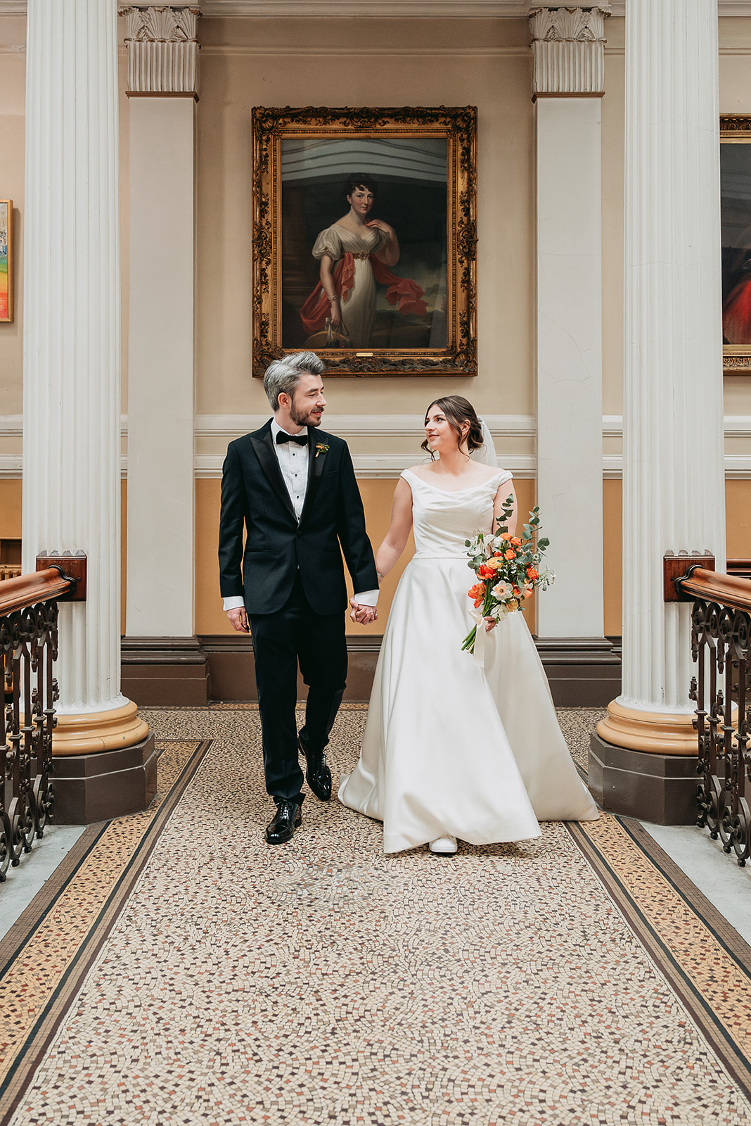 A newly married couple photographed inside Brighton Town Hall