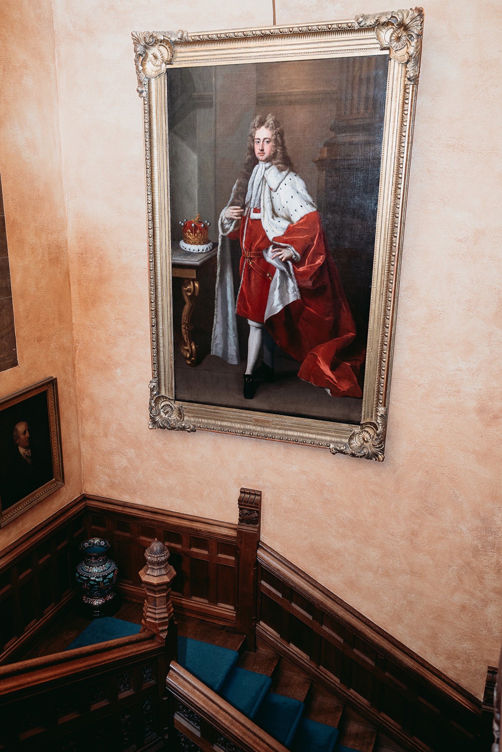 Historic portrait and staircase inside Cowdray House