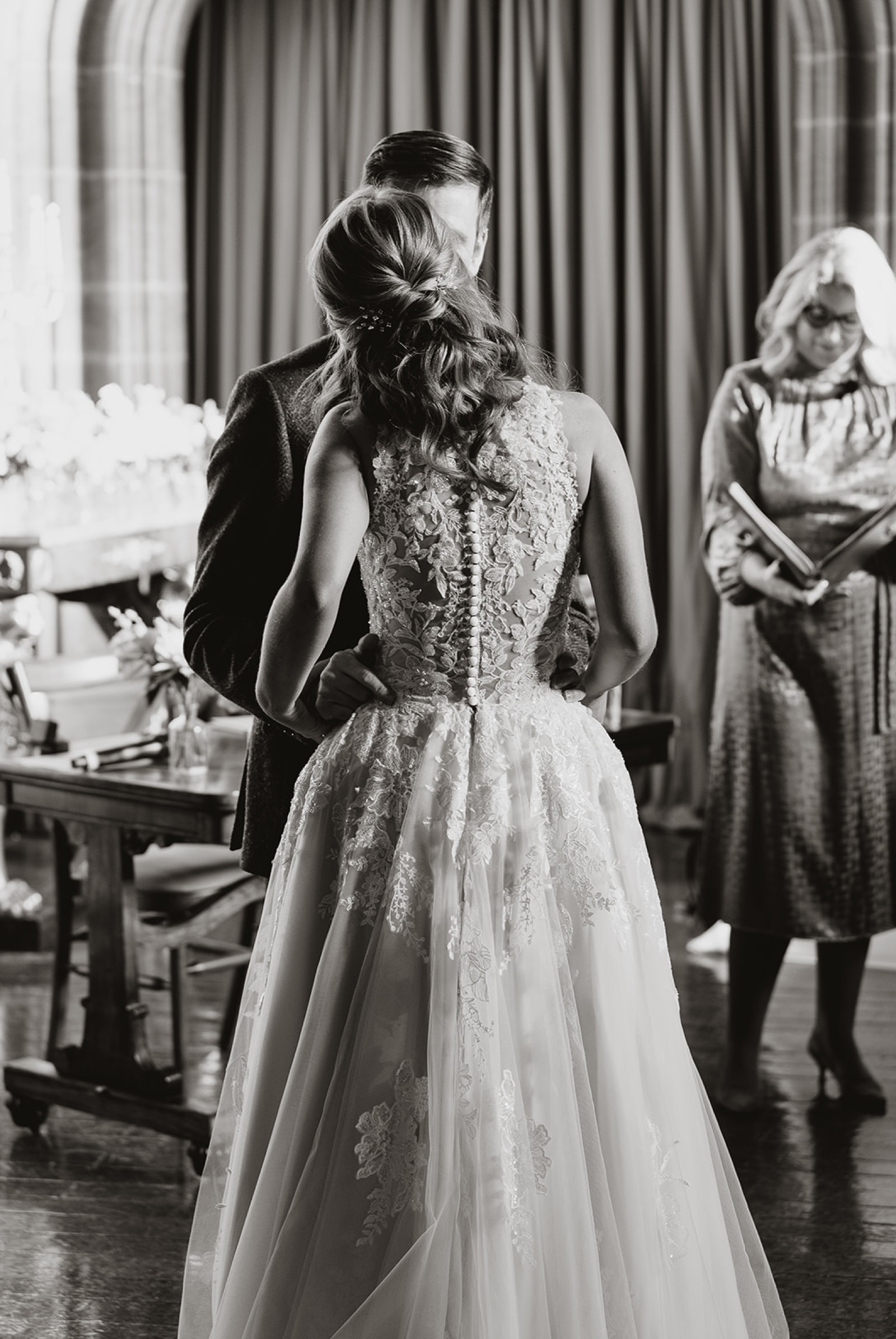 Newlyweds sharing their first kiss during the ceremony