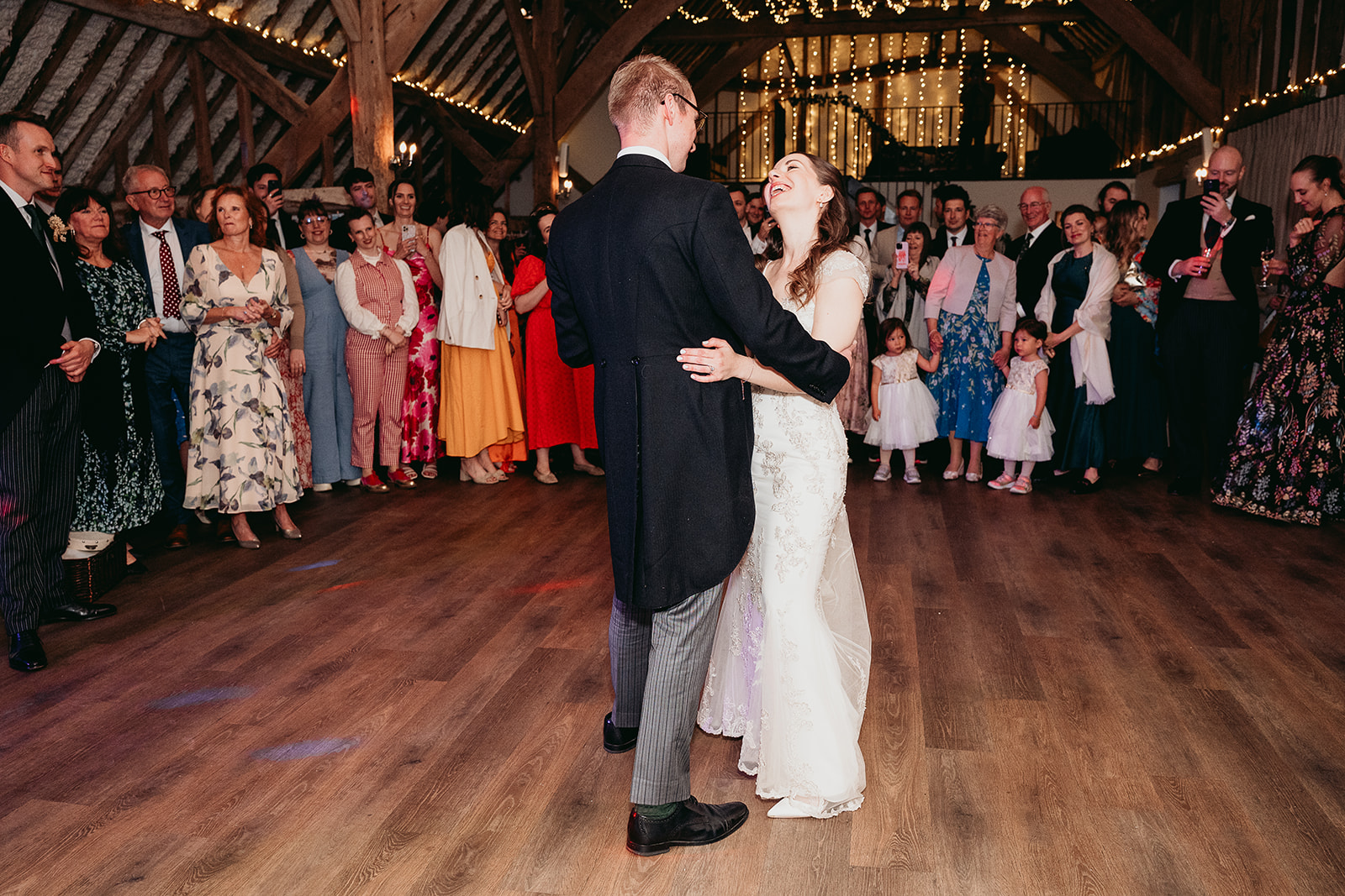 Colourful evening dancing at Jodie and Jordan's Fitzleroi Barn wedding