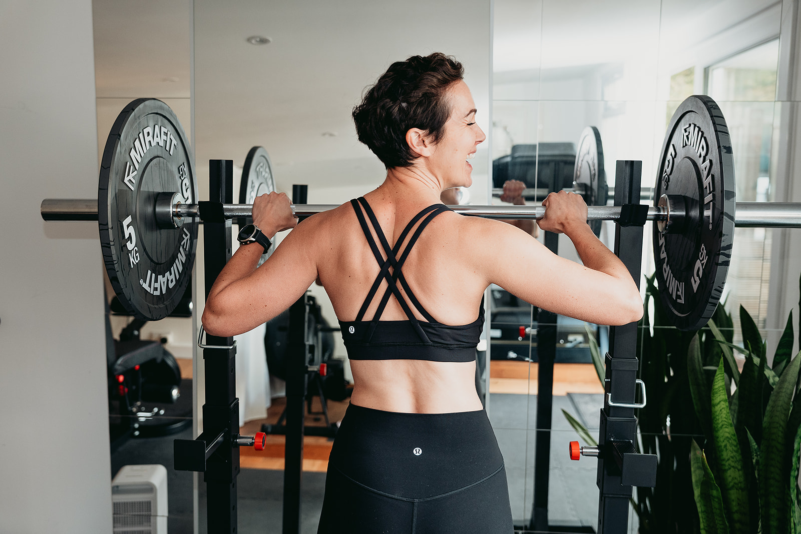 Belinda Moody strength training in her home gym