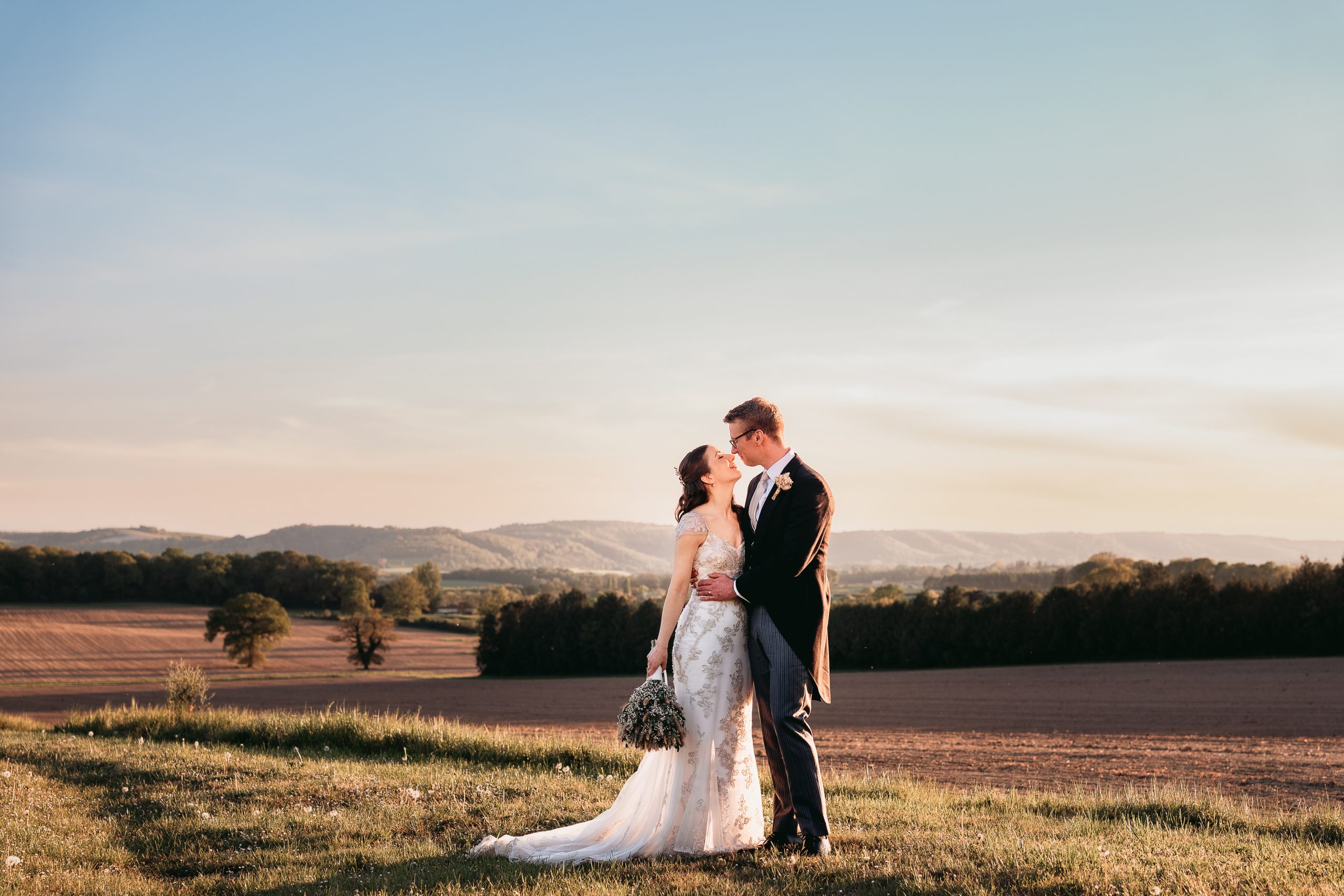 Jodie and Jordan enjoying the panoramic South Downs view from Fitzleroi Barn in West Sussex
